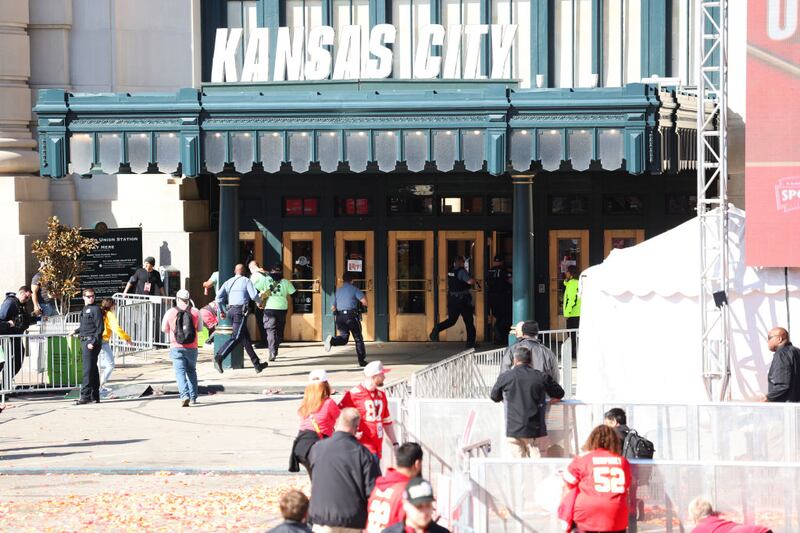 KANSAS CITY, MISSOURI - FEBRUARY 14: Law enforcement and medical personnel respond to a shooting at Union Station during the Kansas City Chiefs Super Bowl LVIII victory parade on February 14, 2024 in Kansas City, Missouri. Several people were shot and two people were detained after a rally celebrating the Chiefs Super Bowl victory. (Photo by Jamie Squire/Getty Images)