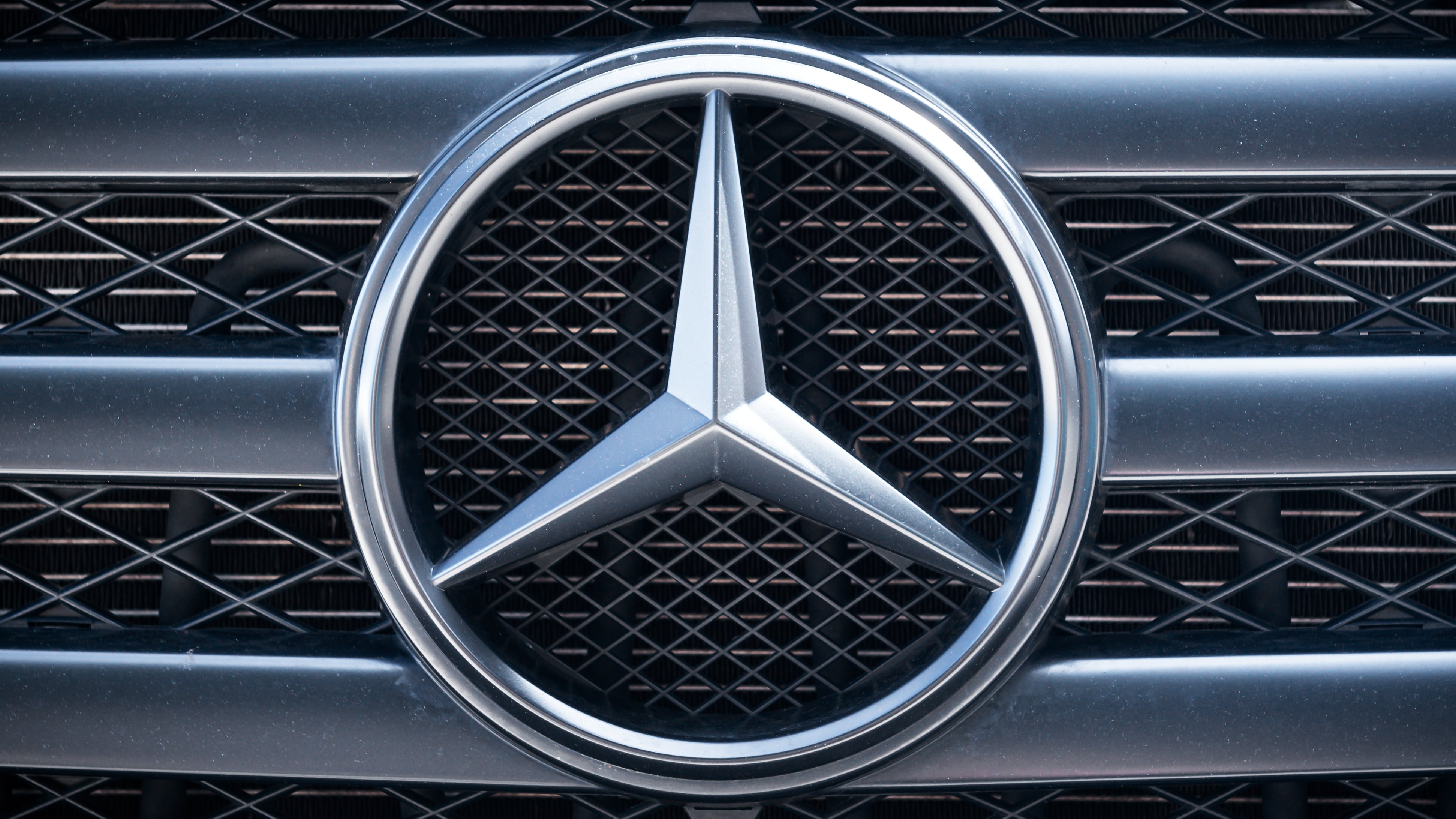Mercedes Benz logo close-up on the car